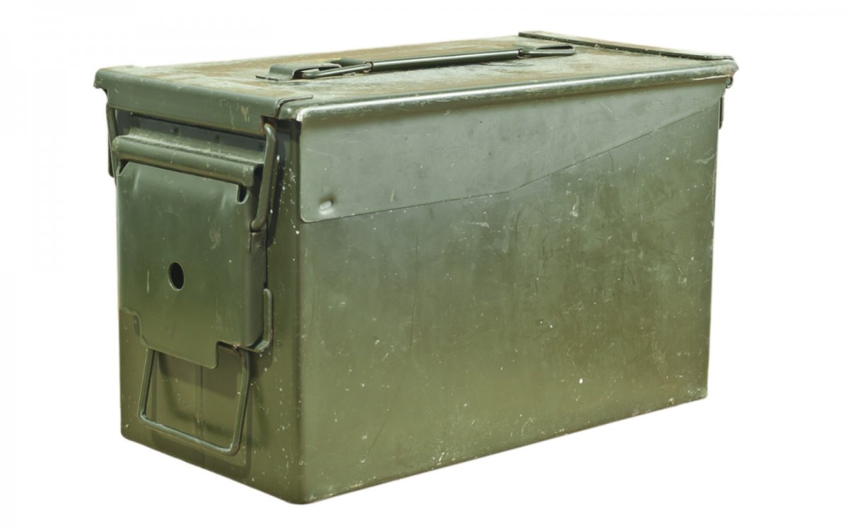 old ammunition can, used as a toilet on the river