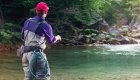 Man in gaiters fishing in North Idaho