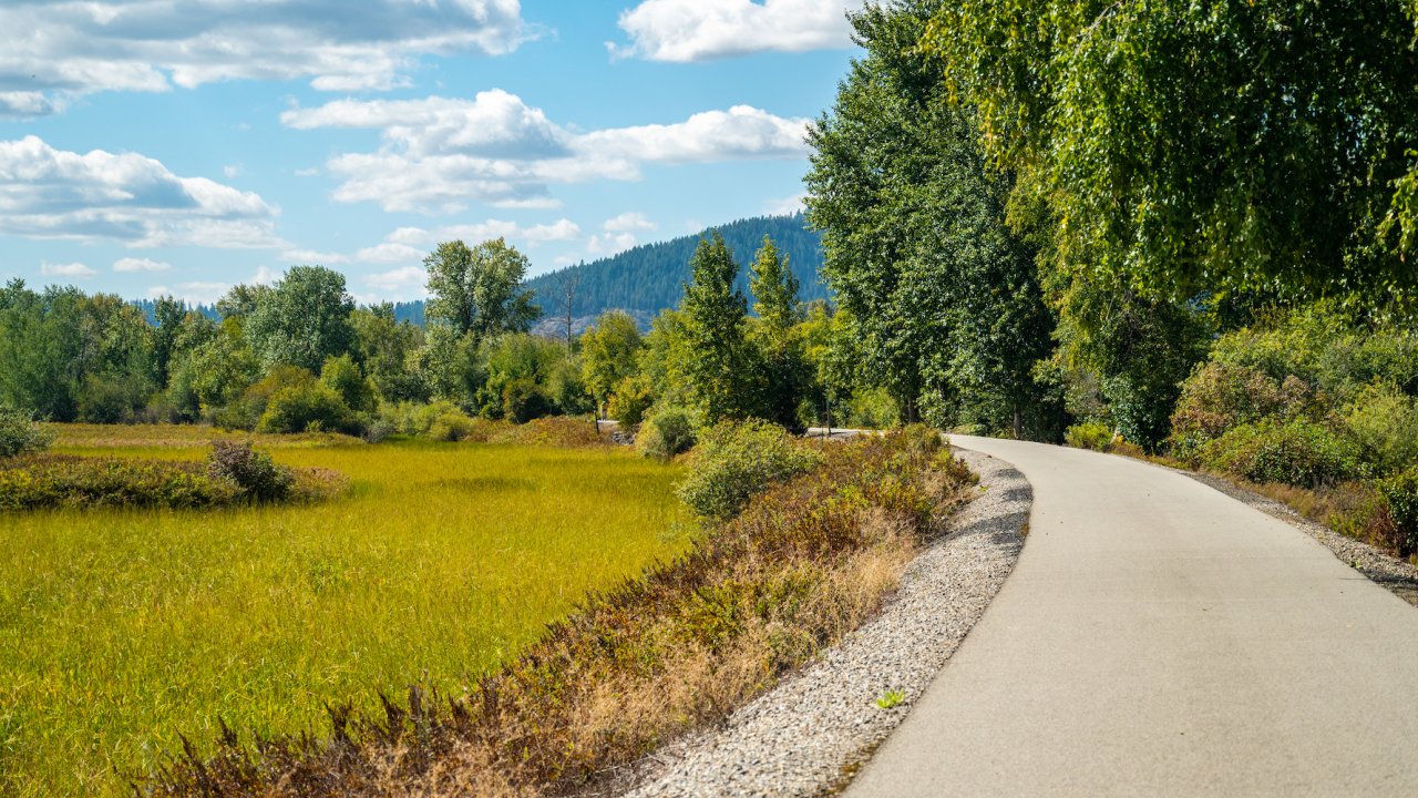 Wide open paved trail great for biking in Northern Idaho