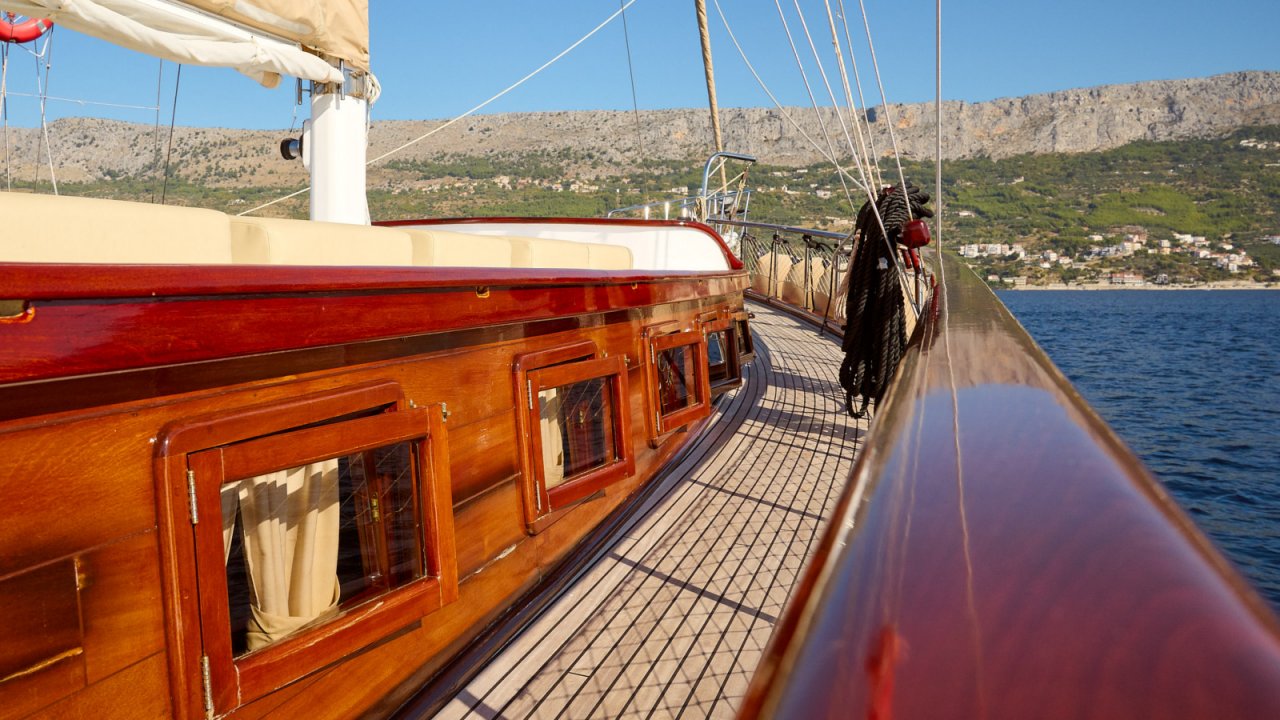 wooden exterior and decking on yacht in water