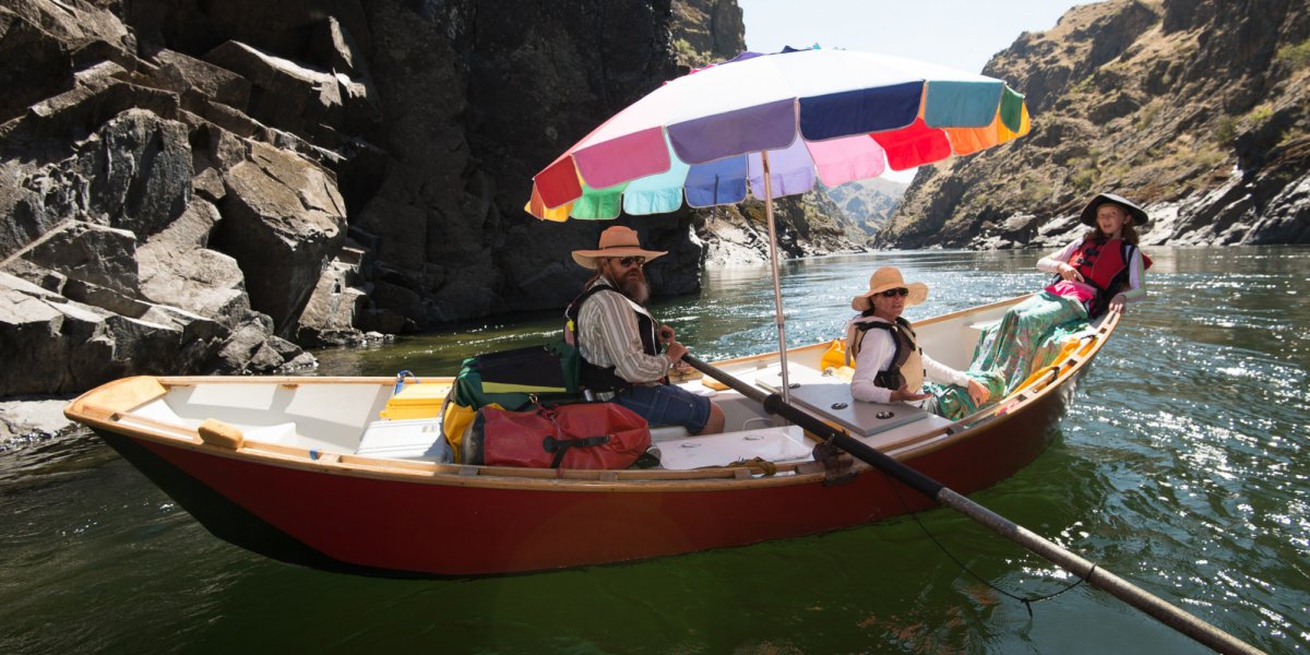 white water raft with umbrella