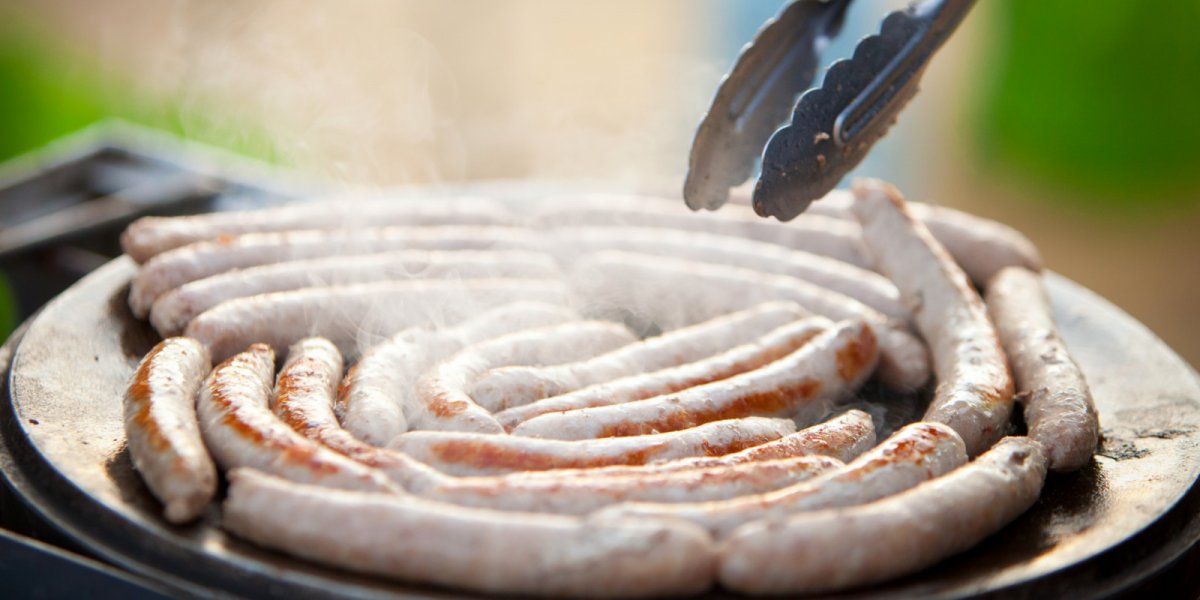 Freshly seared sausage on a ROW Adventures river trip