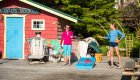 Guests playing corn hole on the sundeck at Gods Pocket