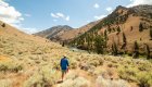 Hiker on Middle Fork Salmon River trail during an Idaho hiking tour with raft support
