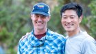 Two men smiling on a rafting trip