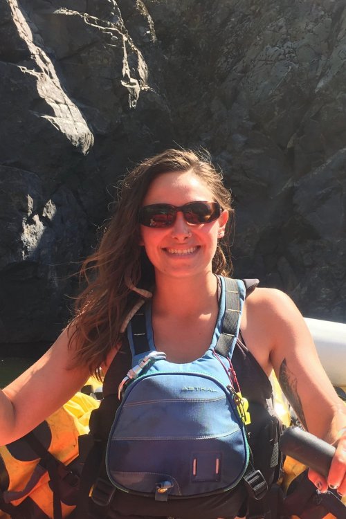 Female river guide in PFD