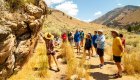 a group of rafters looking at rock art in Idaho