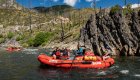 red river raft with people