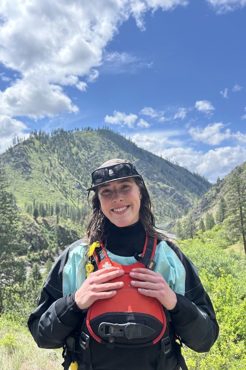 ROW employee smiling at an overlook in Idaho.